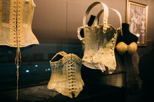 Old style female corsets with cords in museum