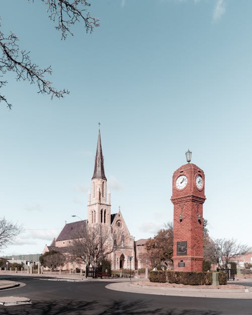 Facade of church and clock tower in town