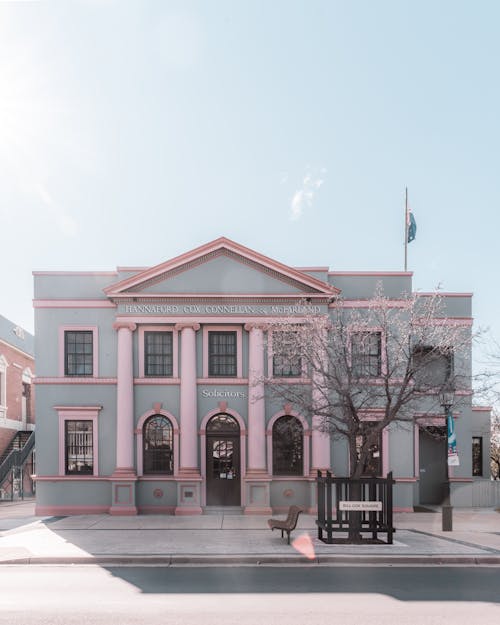 Facade of old building with ornamental walls and columns located in Mudgee in Australia in sunny day