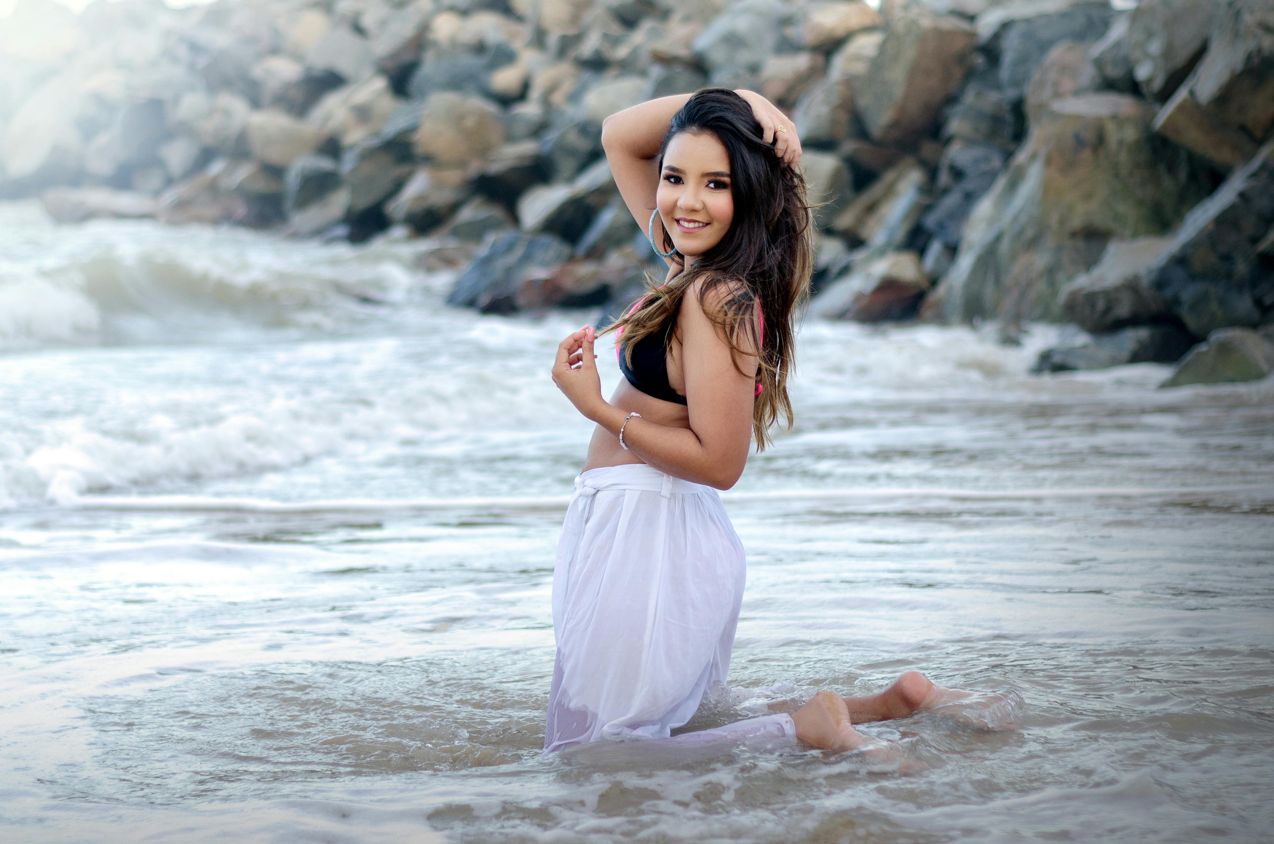 Woman Wearing White Bikini Top Standing Near Body of Water · Free Stock ...