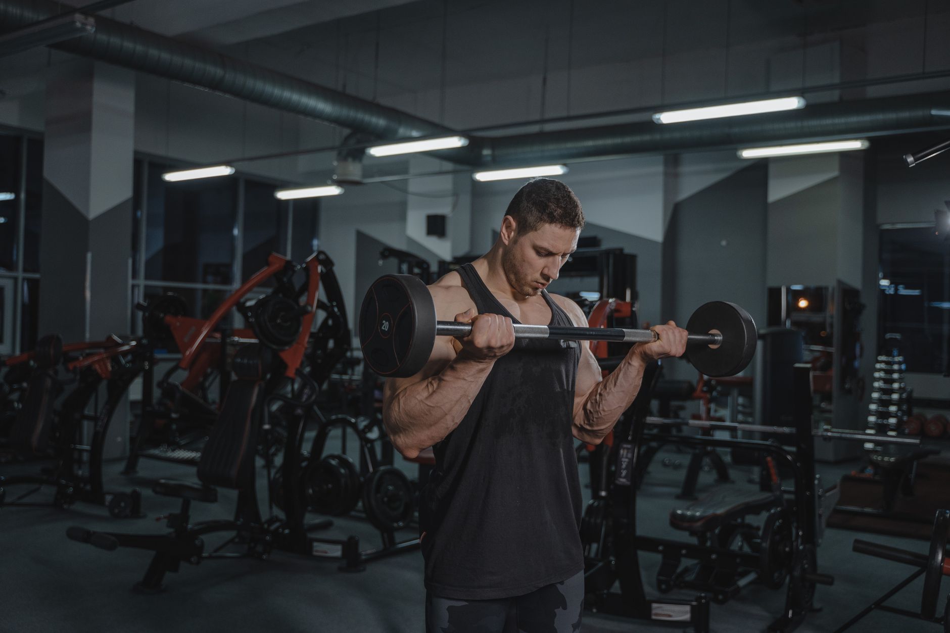 muscular athlete performing bench press with perfect form