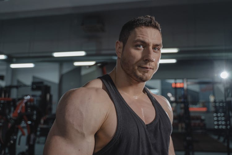 Muscular Man In Black Tank Top