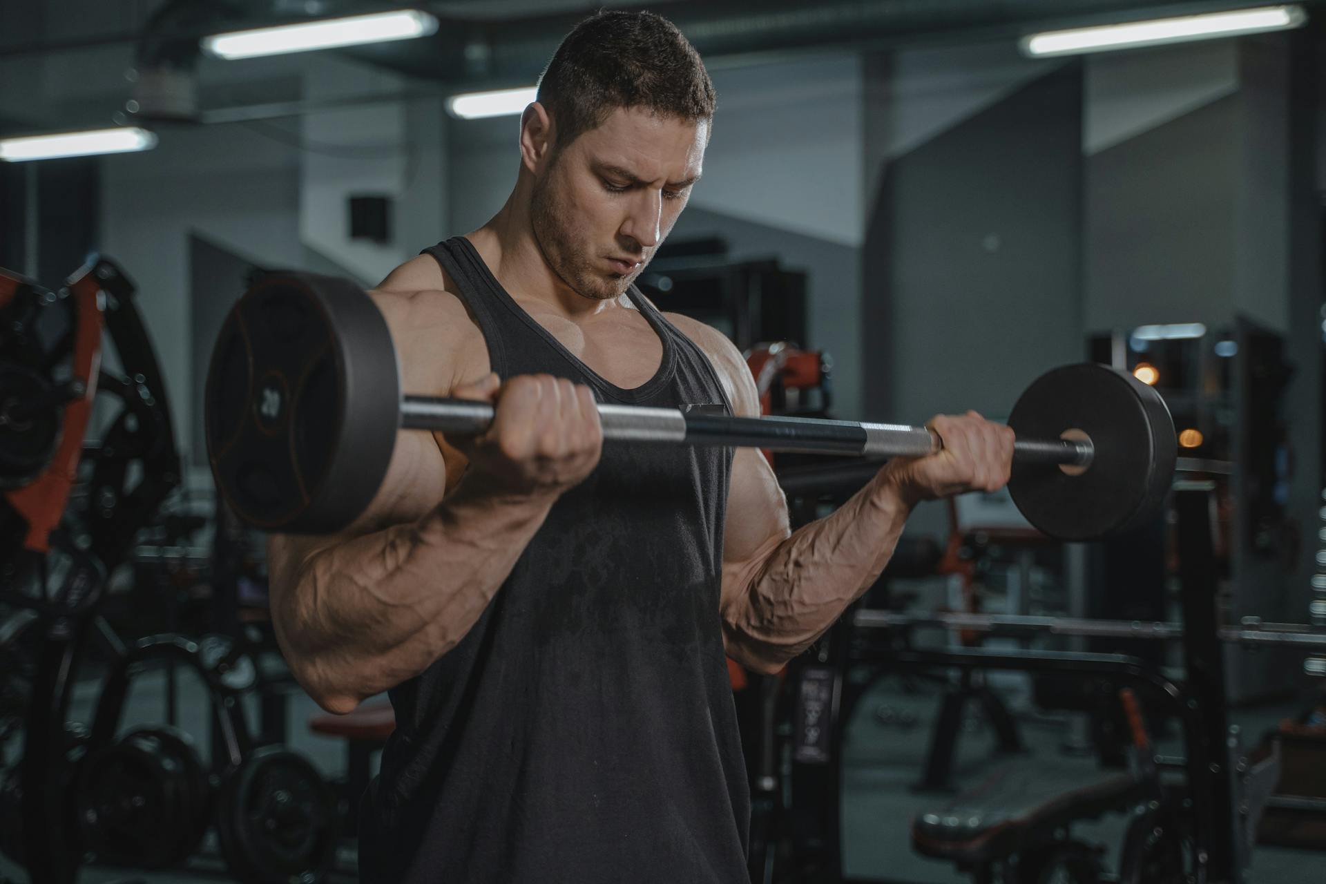 A Man Working Out at the Gym