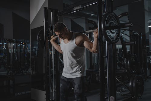 Free A Man Working Out at the Gym Stock Photo