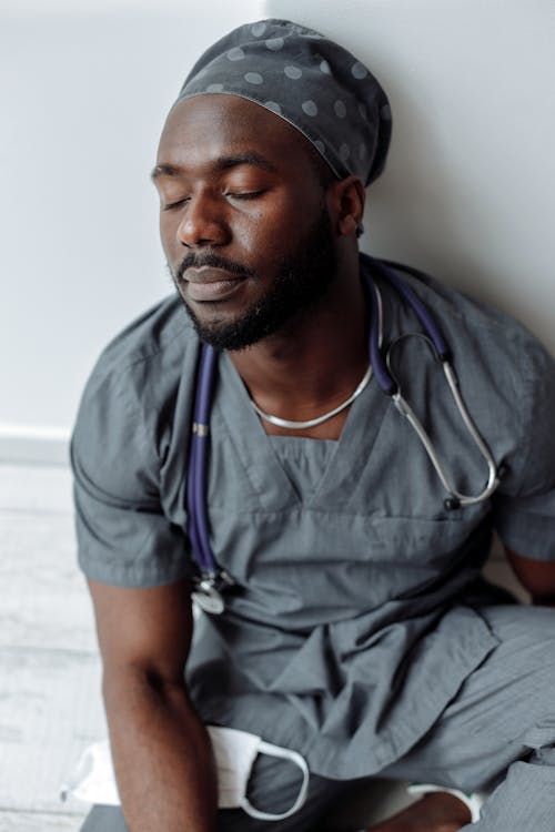 A Medical Professional in Blue Scrub Suit