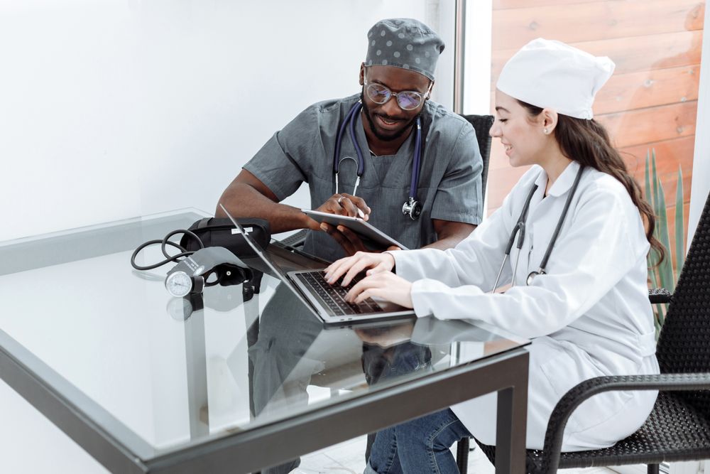 Healthcare professionals reviewing information together