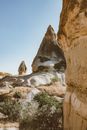 Brown Rock Formation on White Sand