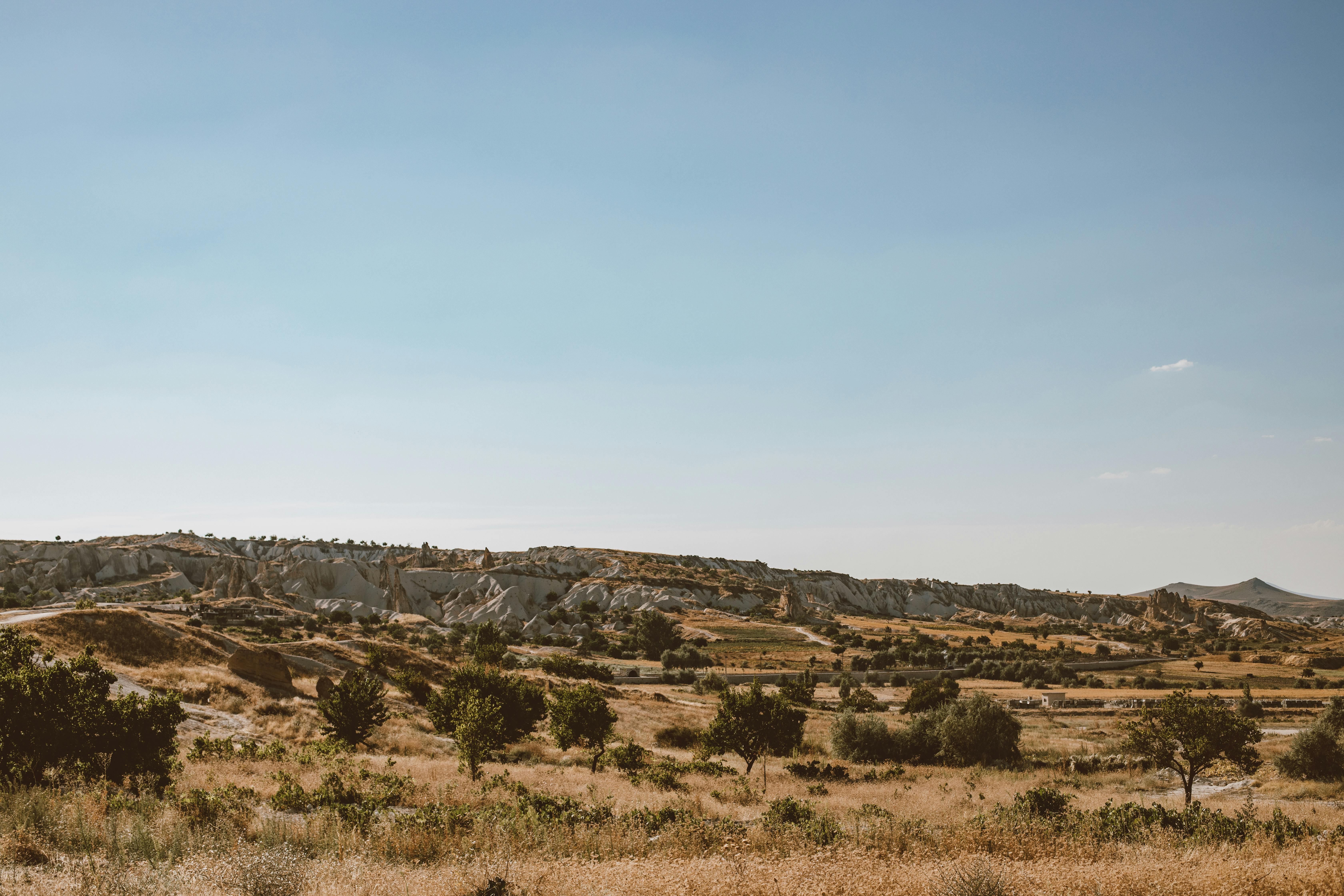 countryside photography of rocky hills