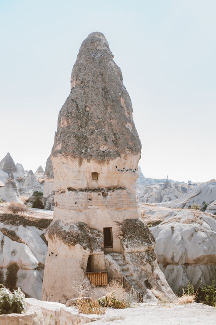 A stunning view of Cappadocia's unique rock formations under soft daylight, emphasizing natural beauty.