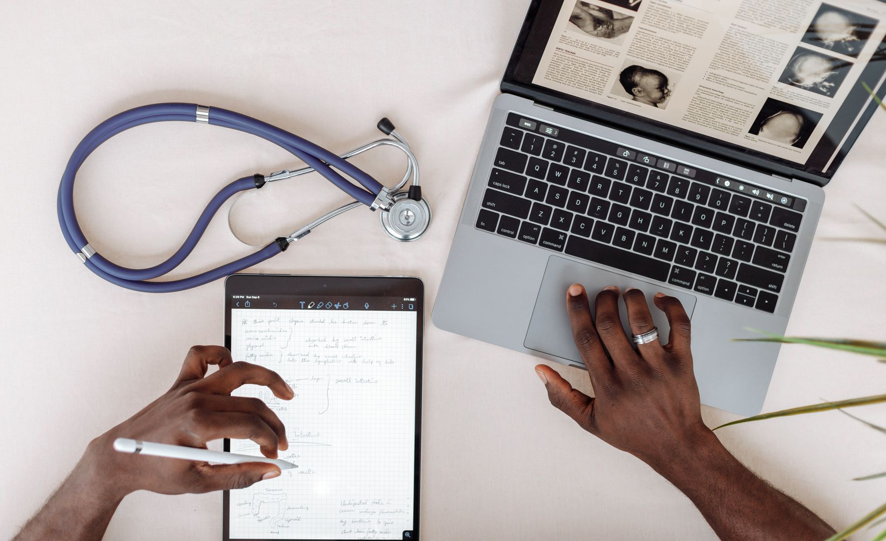 Medical research using laptop and tablet