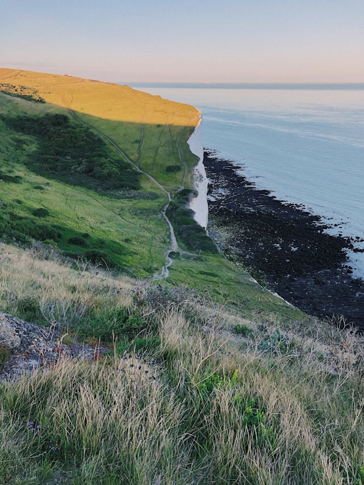 A Cliff Beside A Sea