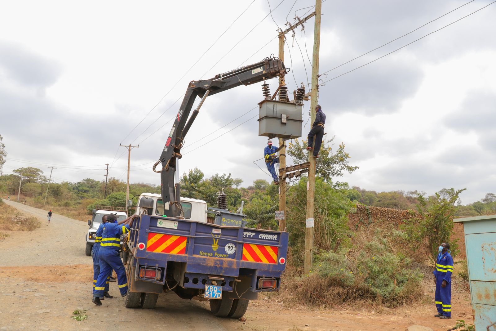 Utility field crew servicing power lines, Kenya