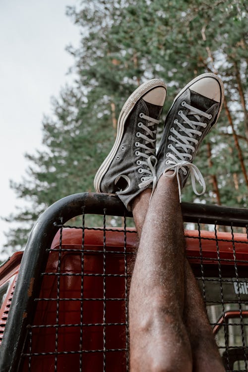 Free Person Wearing Gray Converse Sneakers Stock Photo