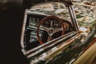A Car Steering Wheel and Dashboard