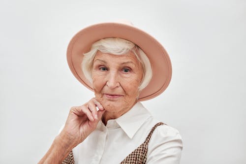 A Stylish Elderly Woman Wearing a Hat