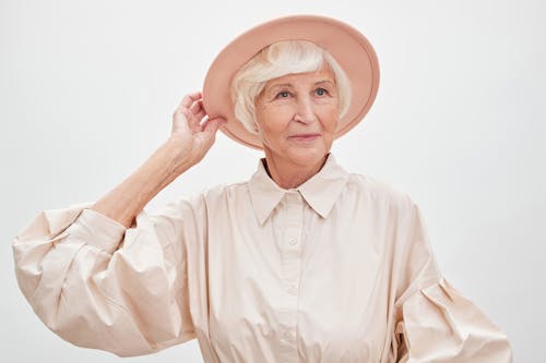 A Fashionable Elderly Woman Wearing a Hat