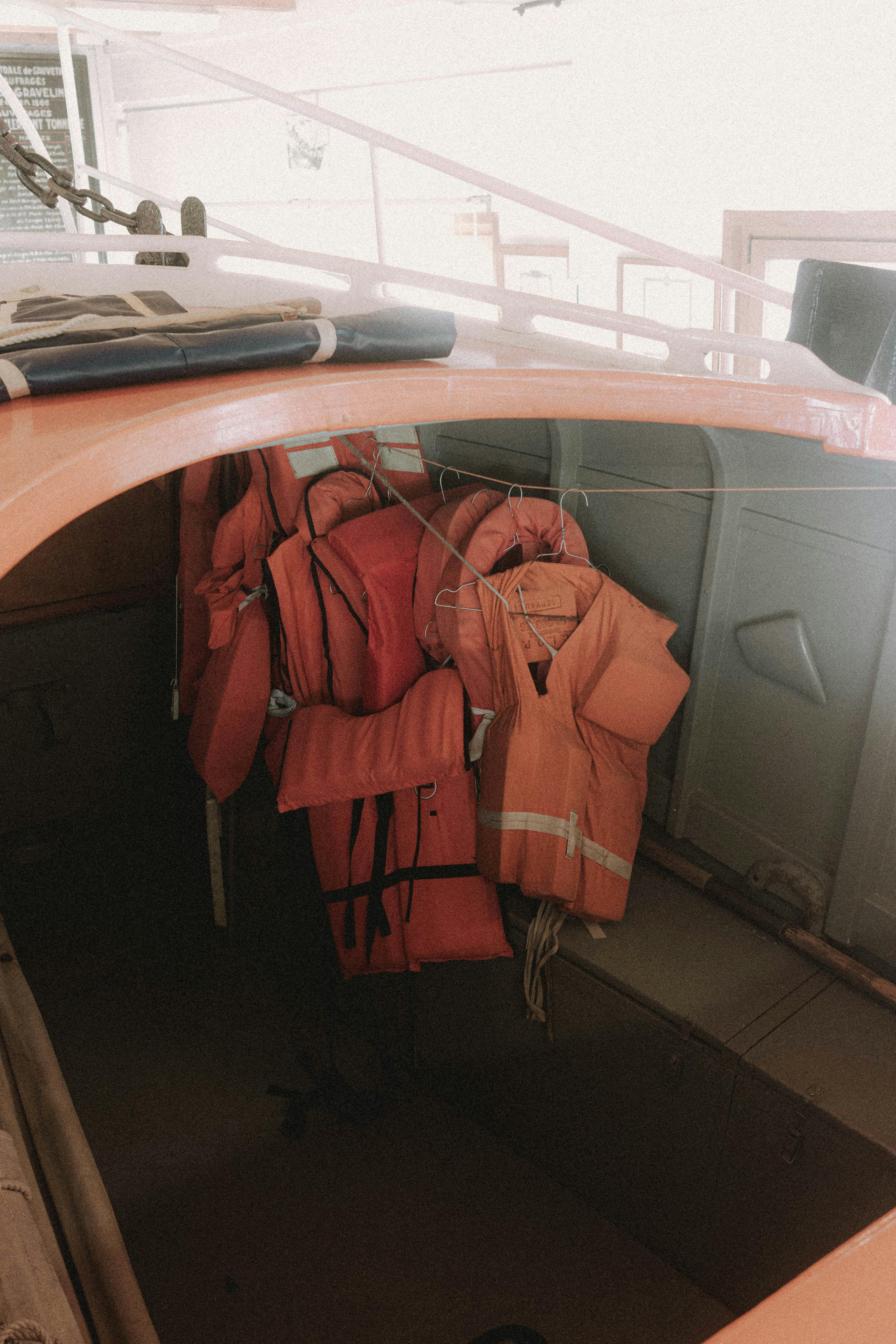 Life vests stacked in a boat