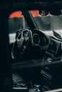 Black steering wheel and dashboard in car
