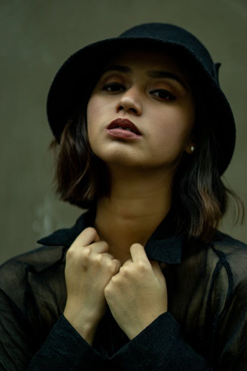 Woman in Black Hat and Black Jacket