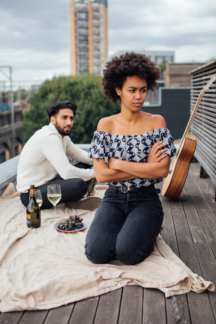 Annoyed Woman In Off-Shoulder Top 