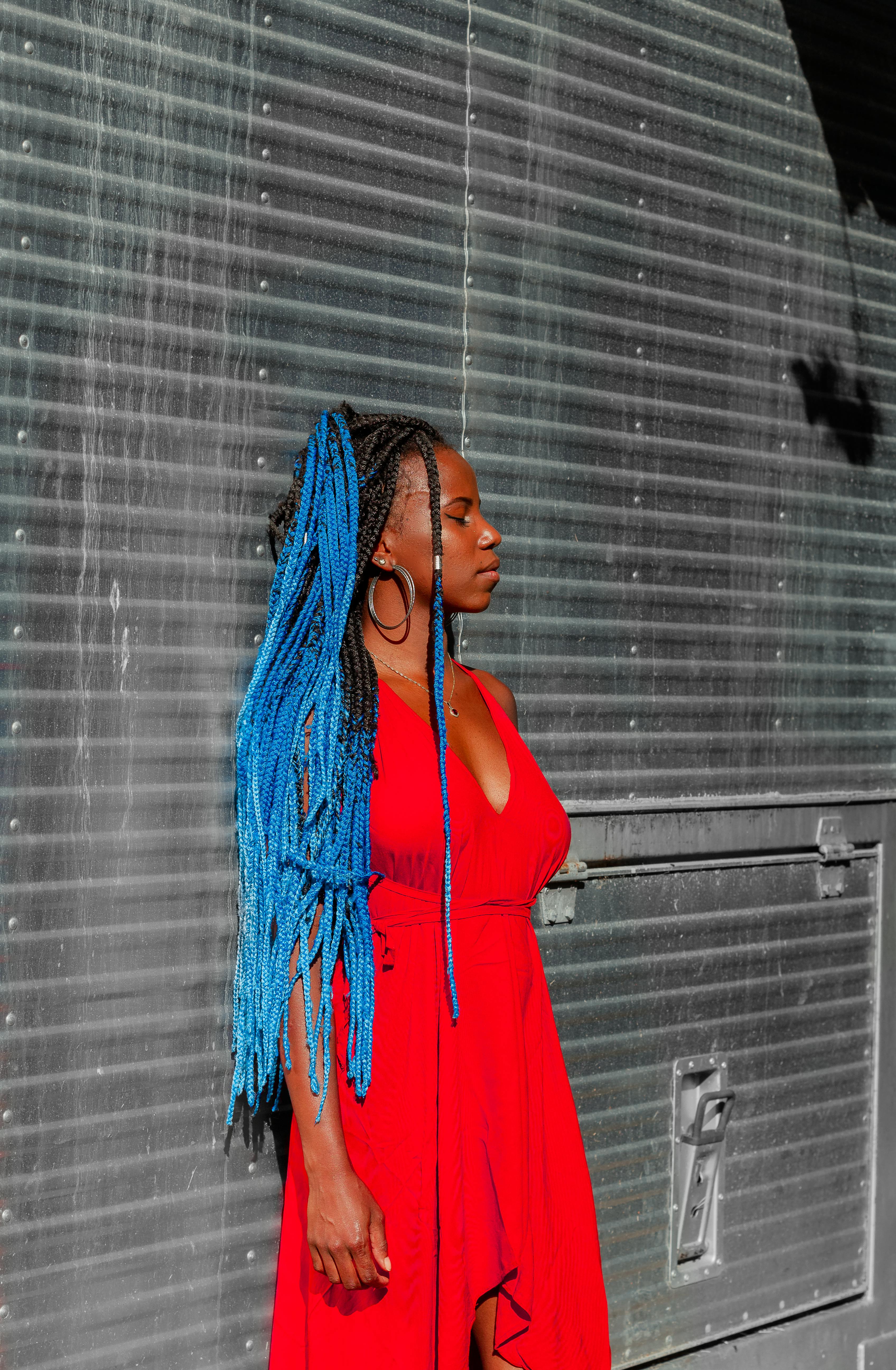 Woman Wearing Black and Red Long-sleeved Mini Dress and Red