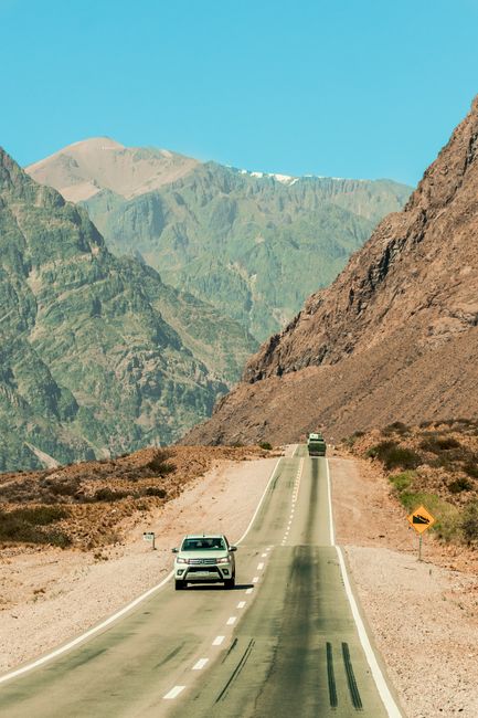 Scenic drive on a winding road through Mendoza's Andes mountains.