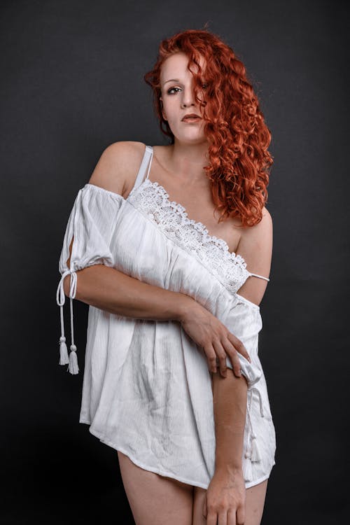 Free Woman in White Lace Spaghetti Strap Dress Stock Photo