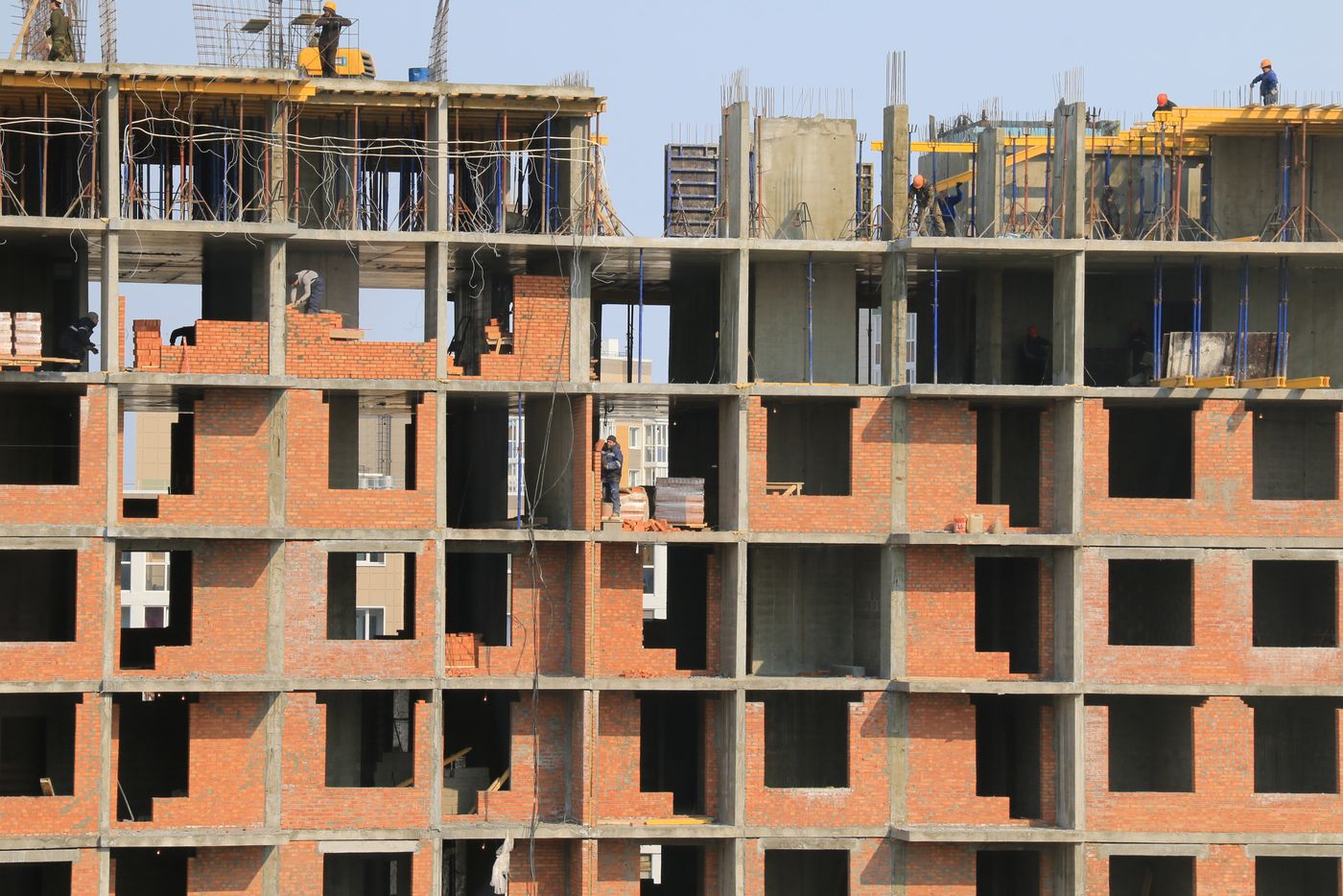Construction team working on a building and civil engineering site