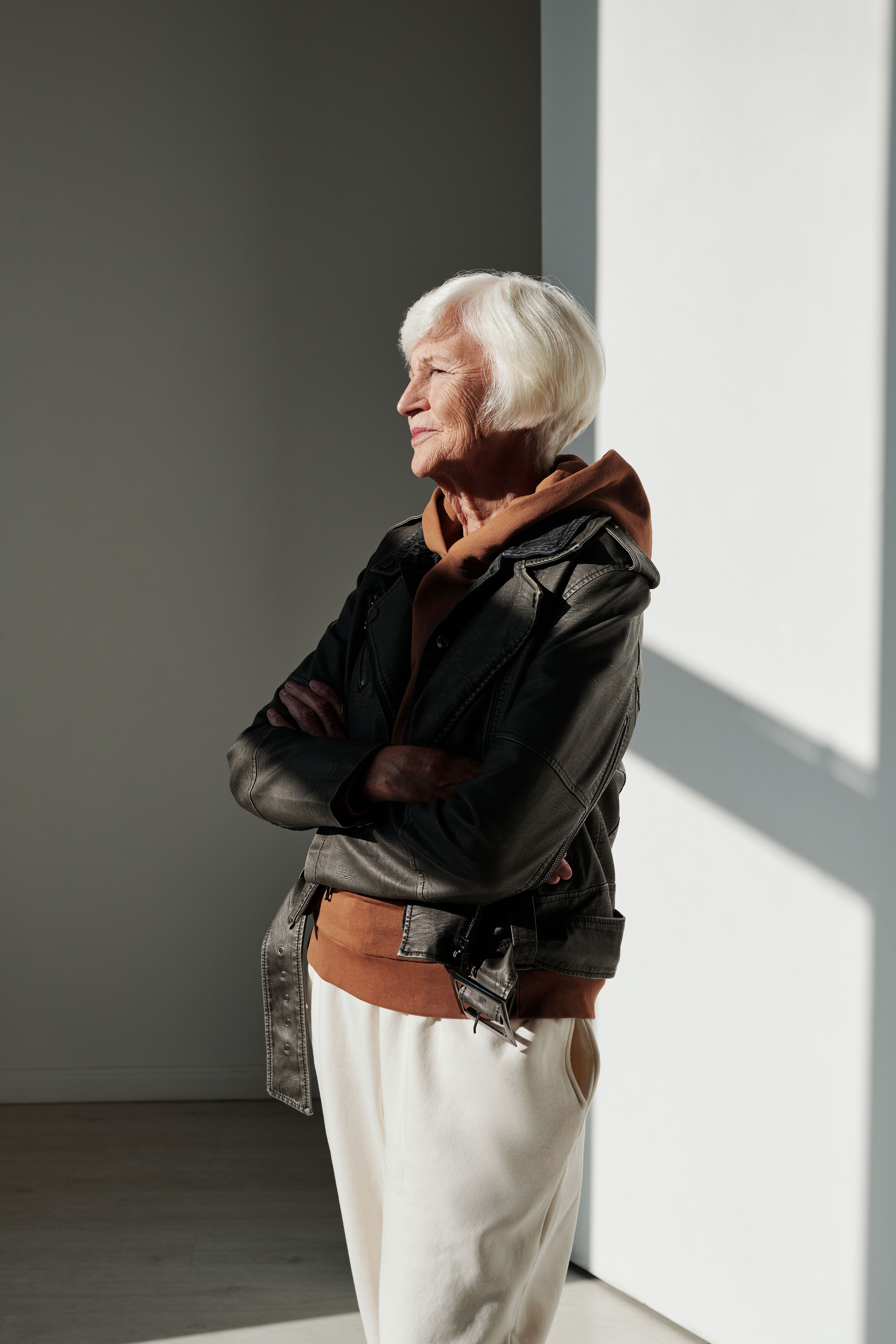 Woman in Leather Jacket Posing · Free Stock Photo