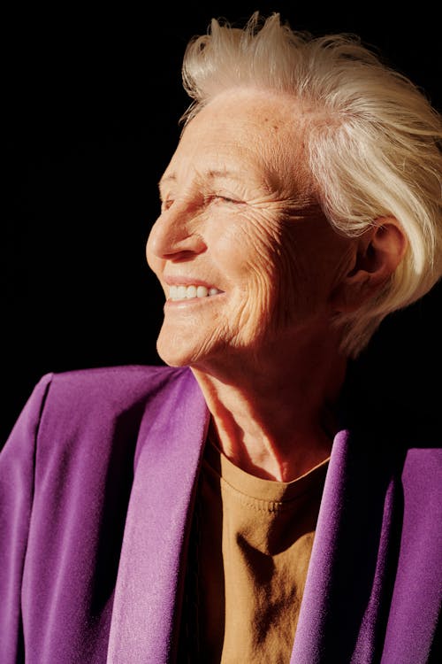 Woman in Purple Blazer Smiling