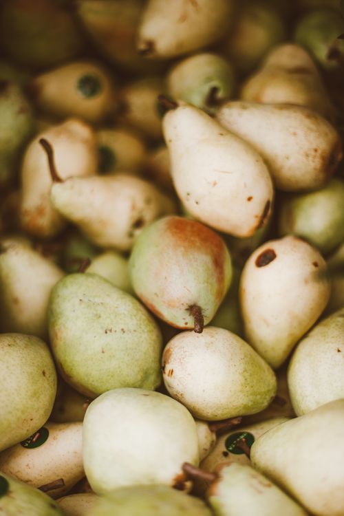 Free Close-up of fresh organic pears showcasing their vibrant colors and textures, ideal for promoting healthy eating. Stock Photo