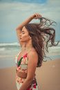 Young woman on sandy beach