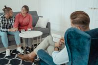 A couple in a guided counseling conversation