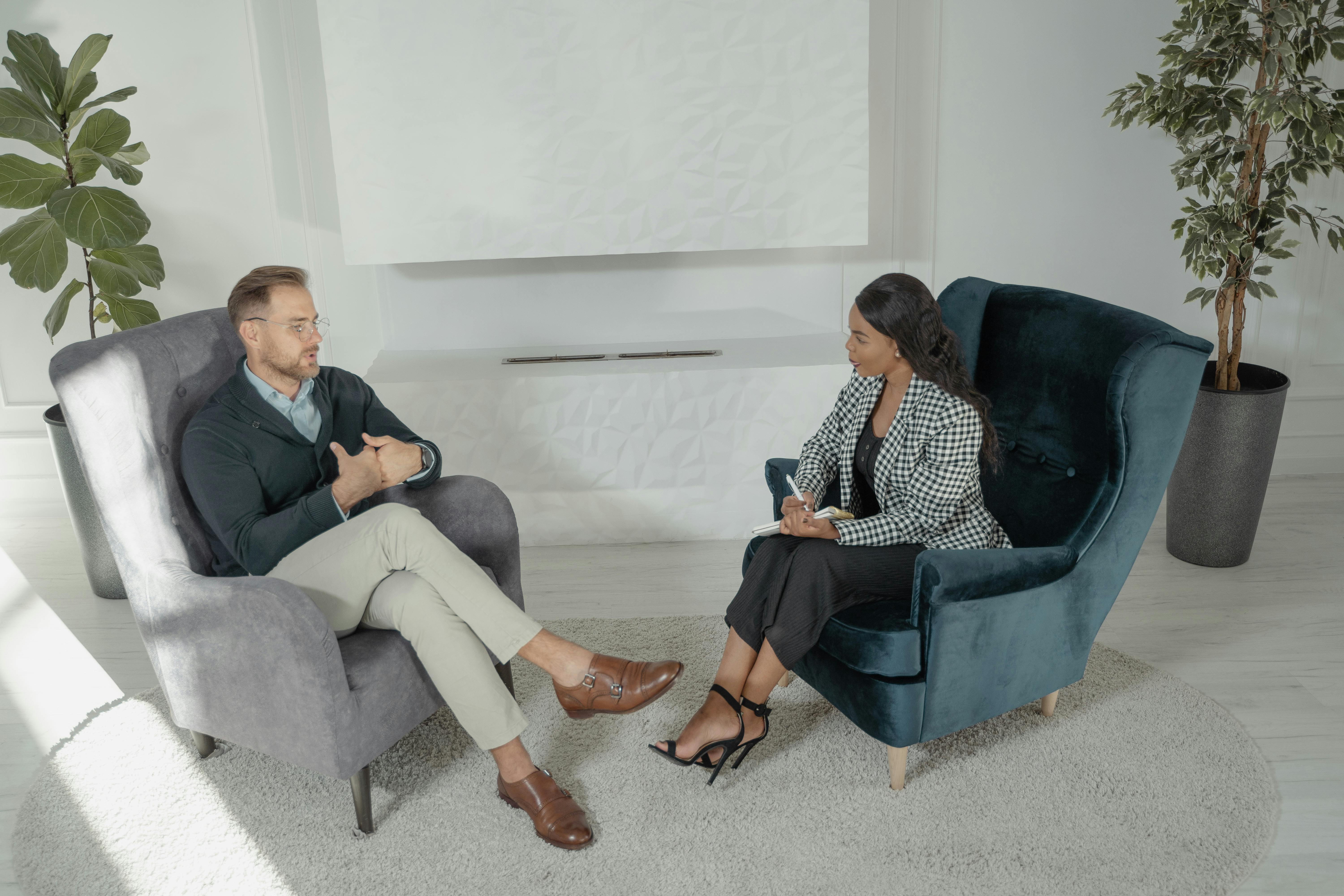 a man and a woman in interview session