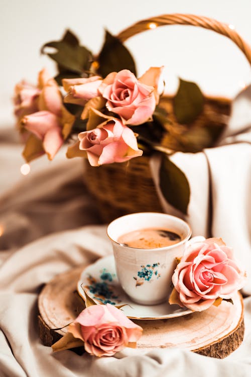 Free Floral Ceramic Teacup on White Ceramic Saucer Stock Photo