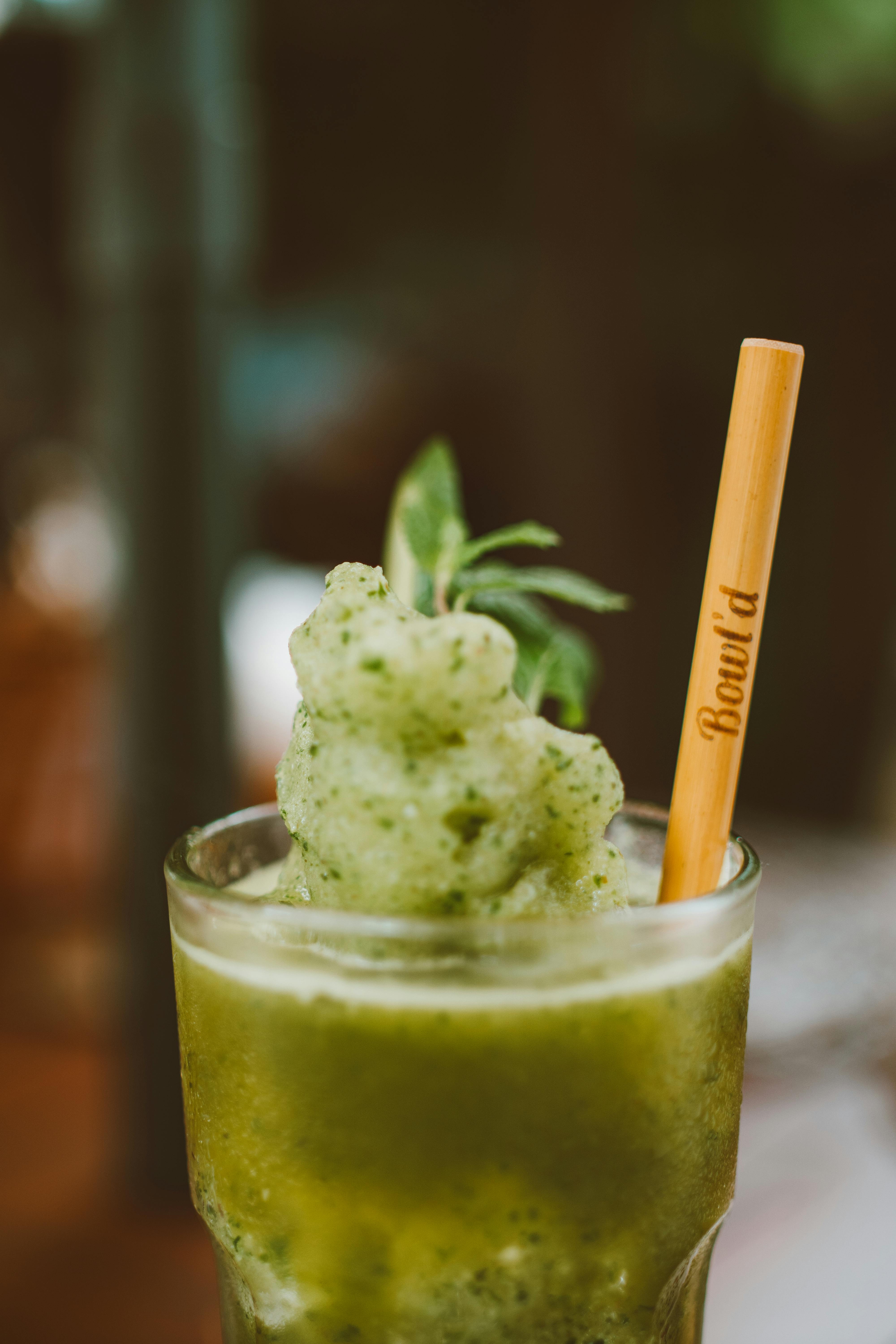 A Green Smoothie In A Glass Cup With Straw · Free Stock Photo