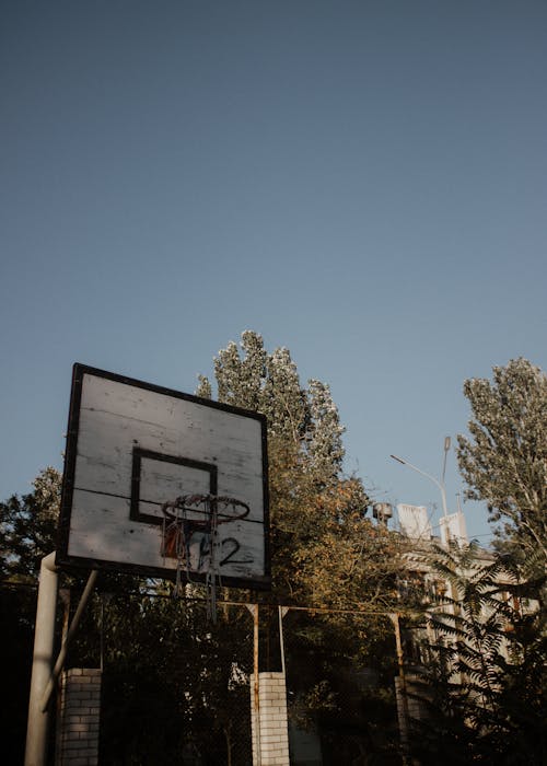 Wooden Backboard and a Basketball Hoop