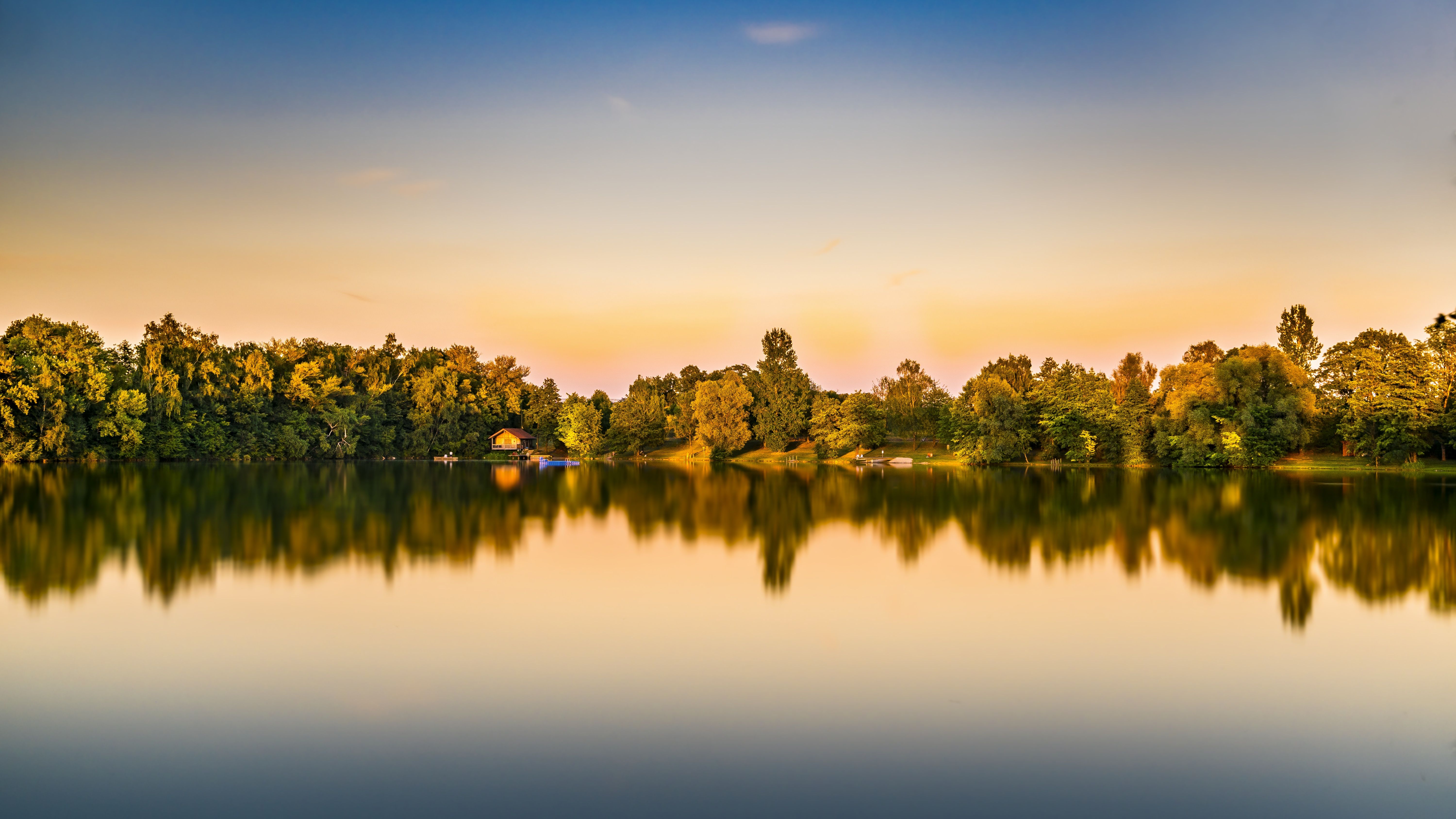 Reflection of Trees on Body of Water During Sunset · Free Stock Photo