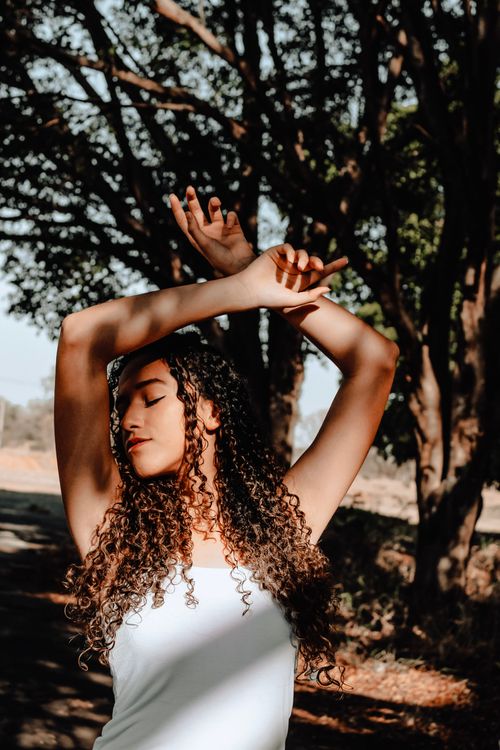Woman Raising Hand · Free Stock Photo