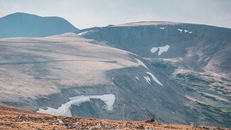 Brown and White Mountains Under White Sky