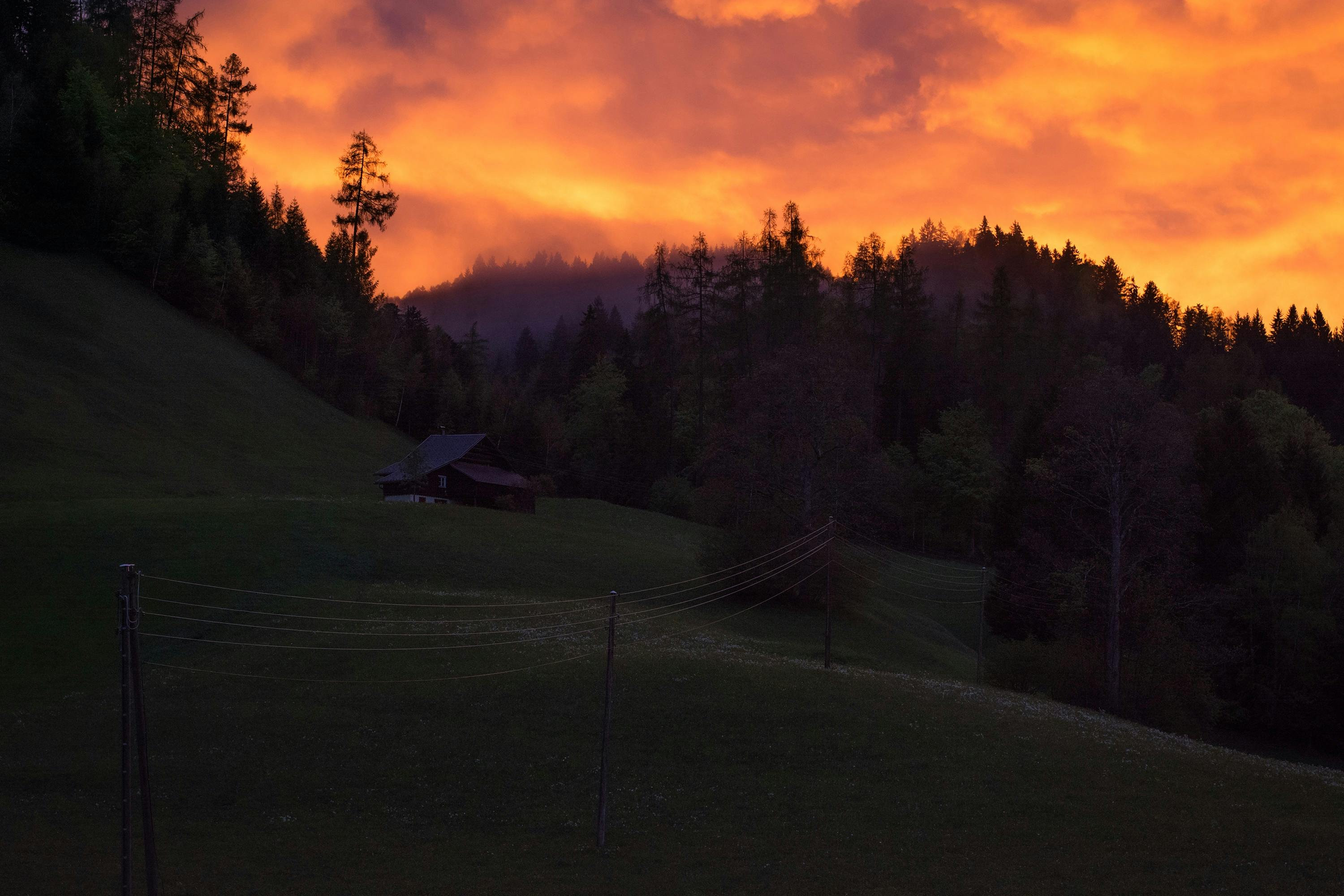 Orange Clouds on Top of Mountain