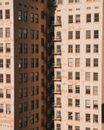 Old geometric residential buildings on city street
