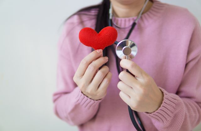 Woman with a stethoscope around her neck