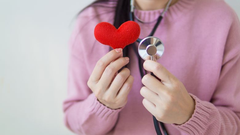 Woman with a stethoscope around her neck