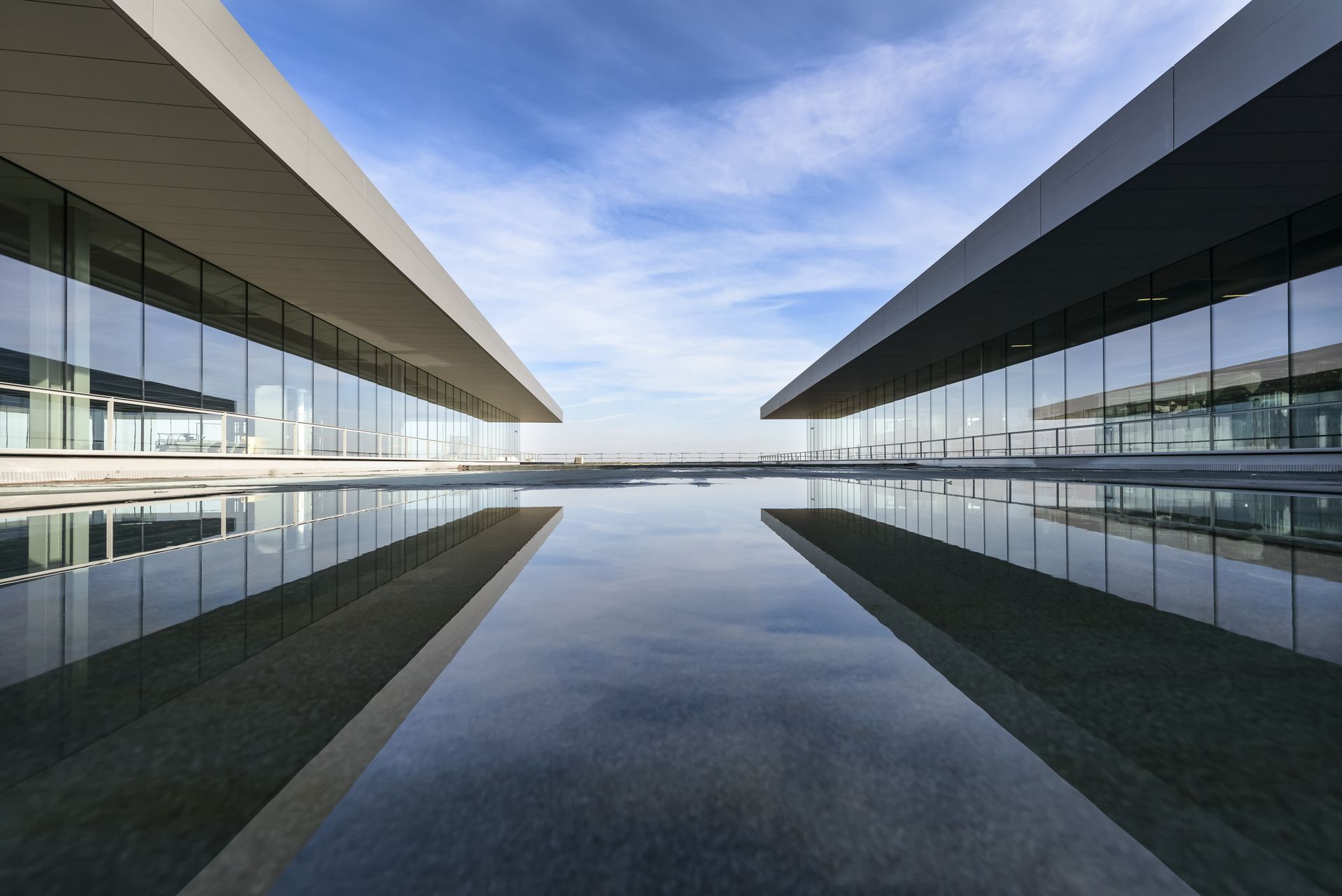 White Building Reflecting on Water