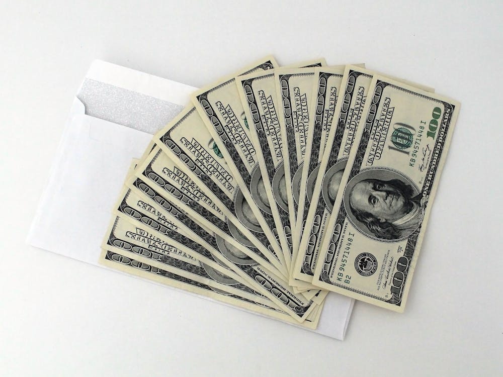 stack of 100 one dollar bills