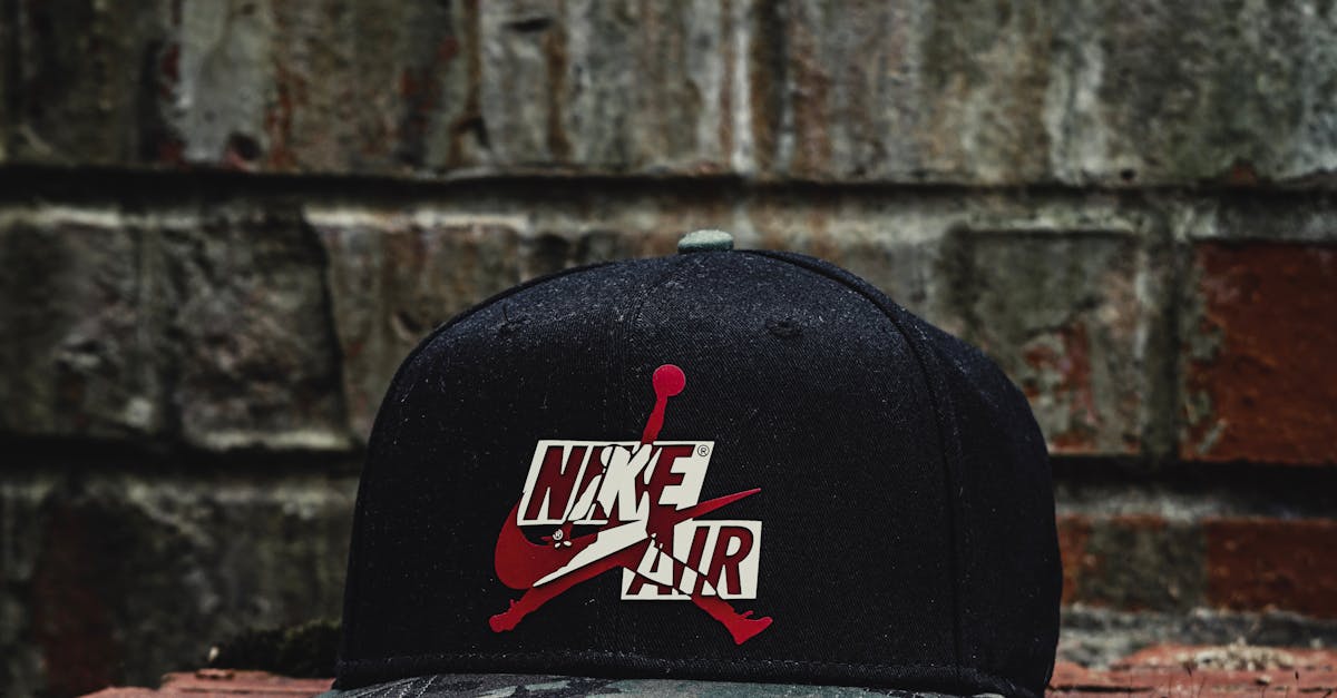 Black Nike Cap on a Concrete Surface · Free Stock Photo
