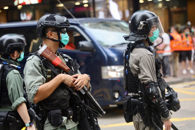 The Riot Police Wearing Their Gears