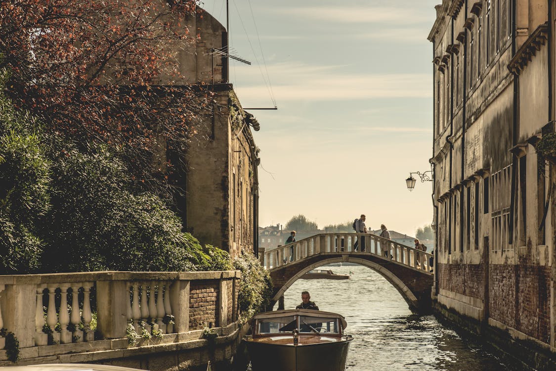 Free White Concrete Bridge Between Houses Stock Photo