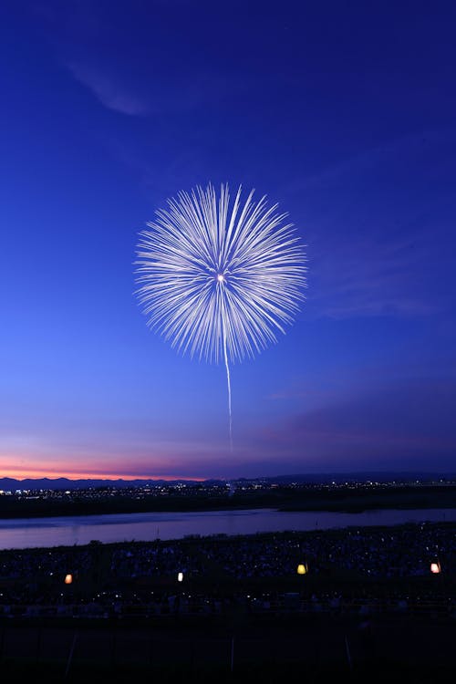 White Fireworks on Blue Sky during Night Time